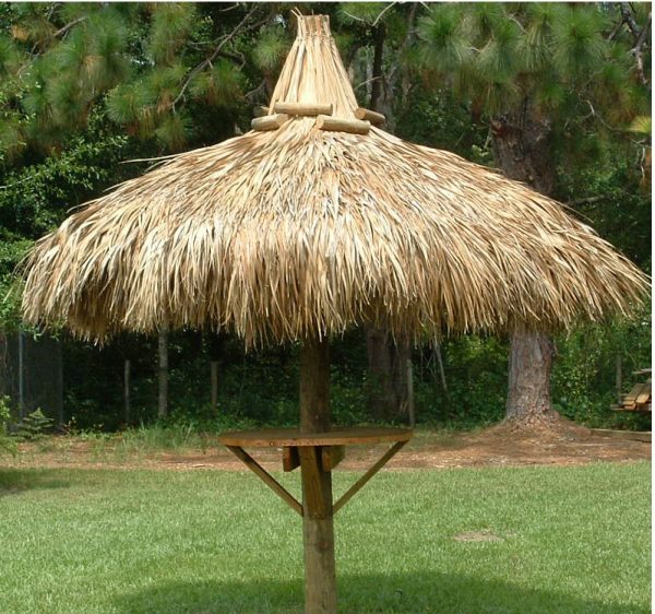 single pole tiki hut with table
